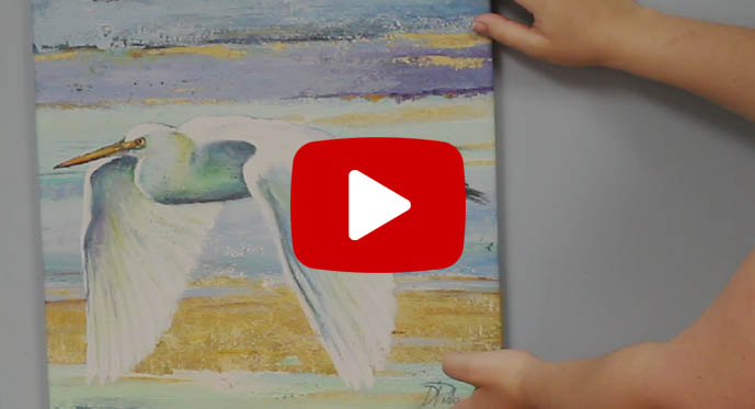 how to hang canvas art video