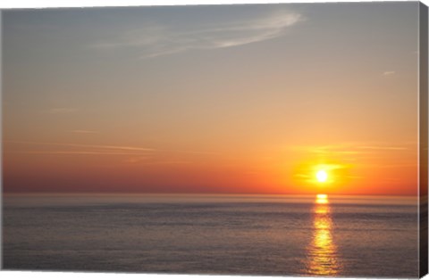 Framed Sunrise over the sea Print