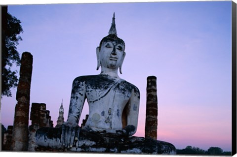 Framed Low angle view of the Seated Buddha, Wat Mahathat, Sukhothai, Thailand Print