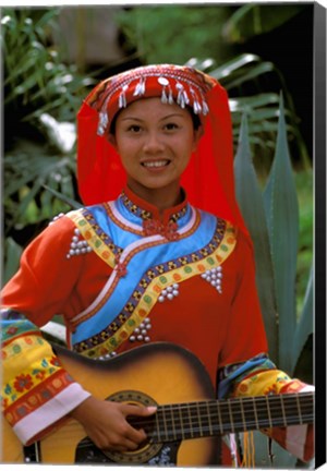 Framed Ethnic Dancer Playing Guitar, Kunming, Yunnan Province, China Print