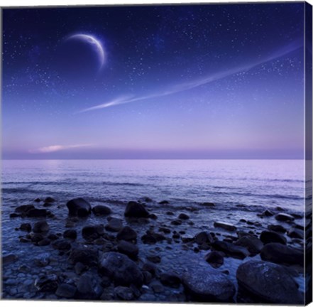 Framed Moon rising over rocky seaside against starry sky Print