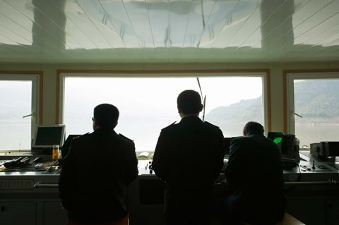 Framed Crew on the bridge of Yangzi River Cruise Ship, Yangtze River, Chongqing Province, China Print