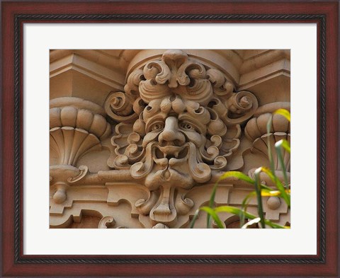 Framed Face In Stone On Buildings Wall Print