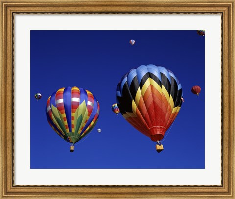 Framed Two Hot Air Balloons Flying Away Together Print