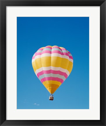 Framed Low angle view of a hot air balloon in the sky, Albuquerque, New Mexico, Yellow &amp; Pink Print