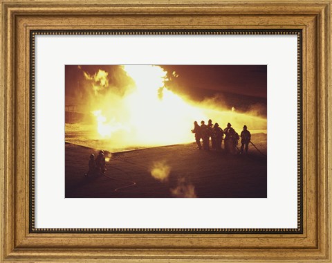 Framed High angle view of firefighters extinguishing a fire Print