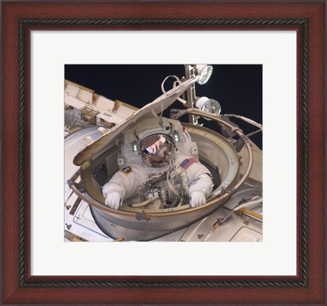 Framed Astronaut Drew Feustel Re-enters the Space Station Print