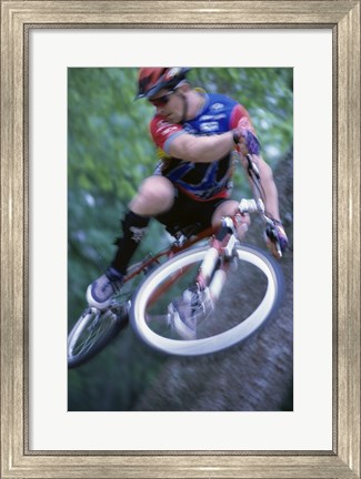 Framed Young man on a bicycle Print