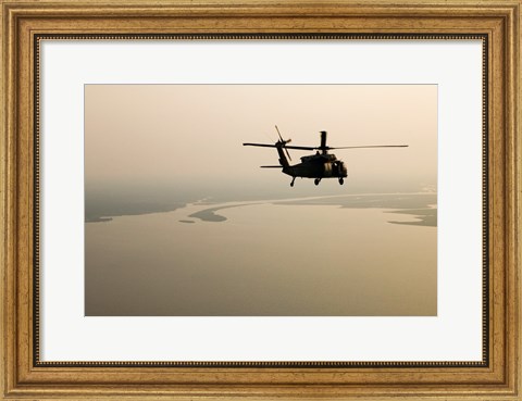 Framed Air Force helicopter flys over Lake Pontchatrain to New Orleans Print