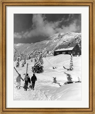 Framed USA, Washington state, three people carrying their skis Print