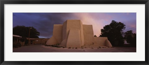 Framed Overcast clouds sky over a church, San Francisco de Asis Church, Ranchos De Taos, New Mexico, USA Print