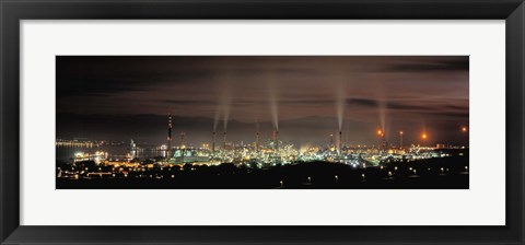 Framed High angle view of oil refinery at lit up at night, La Linea De La Concepcion, Andalusia, Spain Print