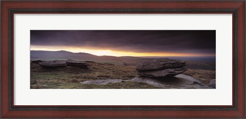 Framed Bright horizon with dark clouds from Higher Tor, Dartmoor, Devon, England Print