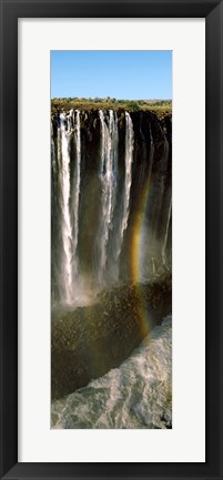 Framed Rainbow forms in the water spray in the gorge at Victoria Falls, Zimbabwe Print