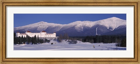 Framed Hotel near snow covered mountains, Mt. Washington Hotel Resort, Mount Washington, Bretton Woods, New Hampshire, USA Print