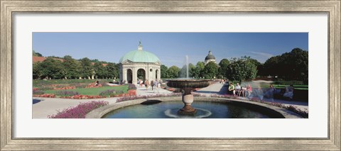 Framed Germany, Munich, Hofgarten, Tourist sitting in the park Print