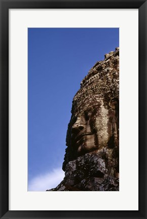 Framed Low angle view of a face carving, Angkor Wat, Cambodia Print