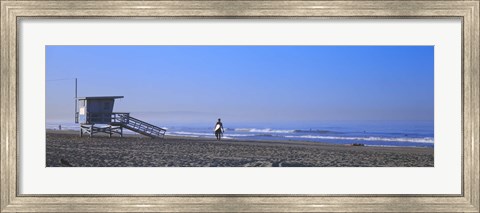 Framed Rear view of a surfer on the beach, Santa Monica, Los Angeles County, California, USA Print