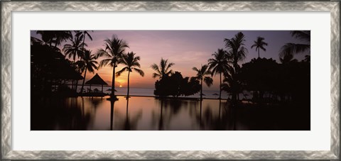 Framed Sunset over hotel pool, Lombok, West Nusa Tenggara, Indonesia Print