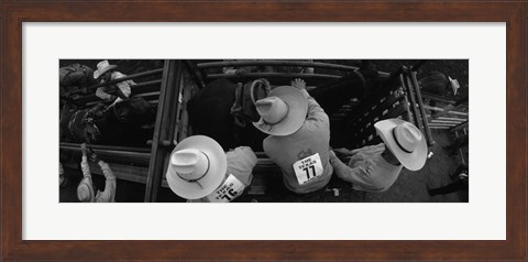 Framed High angle view of cowboys with horses at rodeo, Wichita Falls, Texas, USA Print