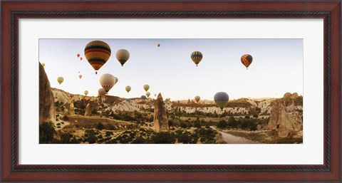 Framed Hot air balloons over landscape at sunrise, Cappadocia, Central Anatolia Region, Turkey Print