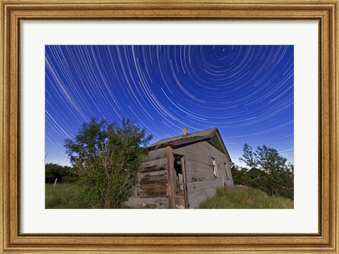 Framed Circumpolar star trails above an old farmhouse in Alberta, Canada Print