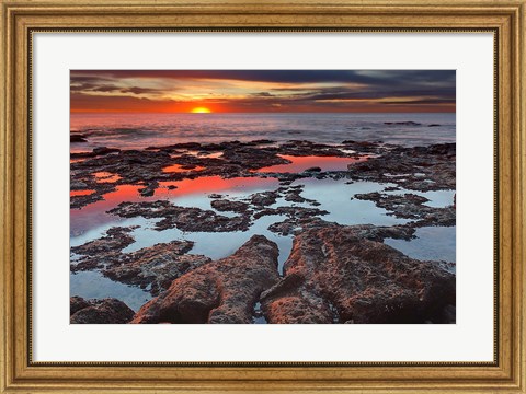 Framed Tidal pools reflect the sunrise colors during the autumn equinox Print