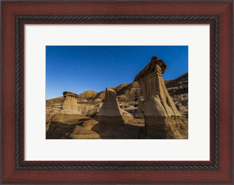 Framed Stars over the hoodoos in the Red Deer River valley, Alberta, Canada Print