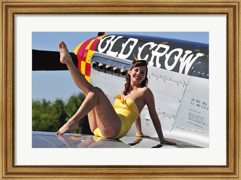 Framed Cute pin-up girl sitting on the wing of a P-51 Mustang Print