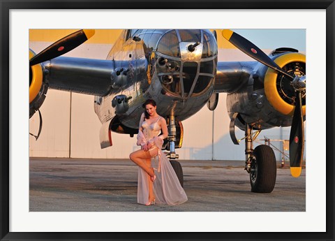 Framed Sexy 1940&#39;s pin-up girl in lingerie posing with a B-25 bomber Print