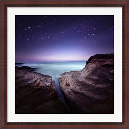 Framed Two large rocks in a sea, against starry sky Print