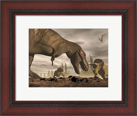 Framed Tyrannosaurus Rex roaring at two Triceratops on rocky terrain Print