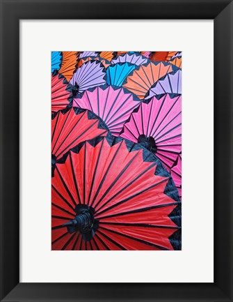 Framed Pattern of newly assembled decorative umbrellas drying in sun, Umbrella Making Center, Bo Sang, near Chiang Mai, Thailand. Print