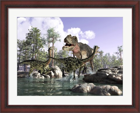 Framed Tyrannosaurus Rex Hunting two Gallimimus Dinosaurs in a River Print
