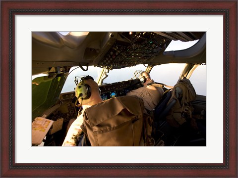 Framed US Army Pilots in-Flight in the Cockpit of a C-17 Globemaster III during a Mission to Qatar Print