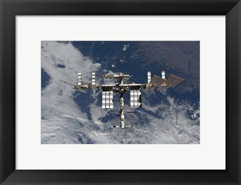 Framed International Space Station Backgropped by a Blue and White Earth Print