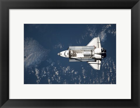 Framed Aerial view of Space Shuttle Discovery over Earth Print