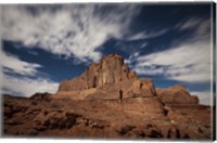 Framed Red rock formation illuminatd by moonlight in Arches National Park, Utah