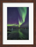 Framed Curtain of Aurora Sweeps Over the Houseboats Moored On Yellowknife Bay