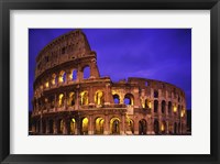 Framed Low angle view of a coliseum lit up at night, Colosseum, Rome, Italy