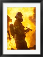 Framed Side profile of a firefighter (holding axe)