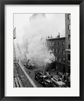 Framed New York City, Fire on East 47th Street, with fire engines shooting water on burning building