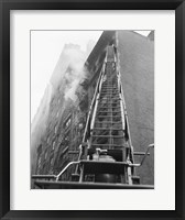 Framed Fire engine with ladder up burning building