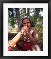 Framed Pamagirri aborigine playing a didgeridoo, Australia
