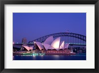 Framed Opera house lit up at dusk, Sydney Opera House, Sydney Harbor Bridge, Sydney, Australia