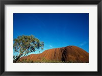 Framed Rock formation on a landscape, Ayers Rock, Uluru-Kata Tjuta National Park, Northern Territory, Australia