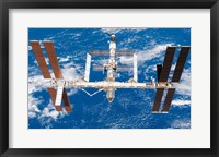 Framed International Space Station moves away from Space Shuttle Endeavour