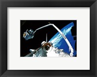 Framed Shuttle discovery Satelite deployment