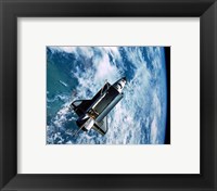 Framed Shuttle Discovery in Space