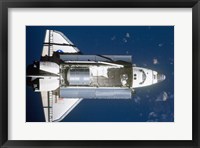 Framed STS-135 Atlantis approaches the ISS